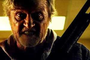 rutger hauer with a shotgun